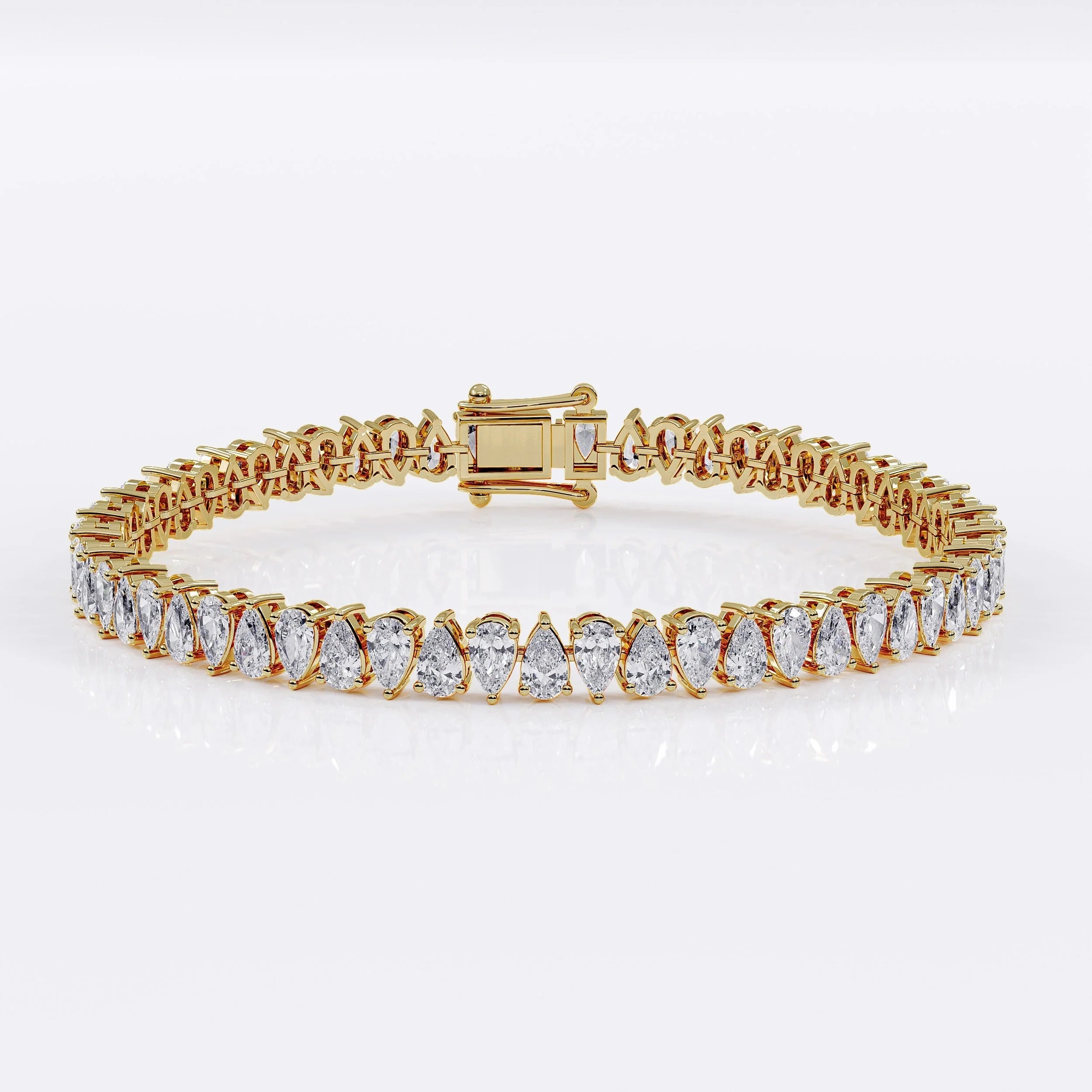 Pear_cut_tennis_bracelet_in_gold La Stella Jewels